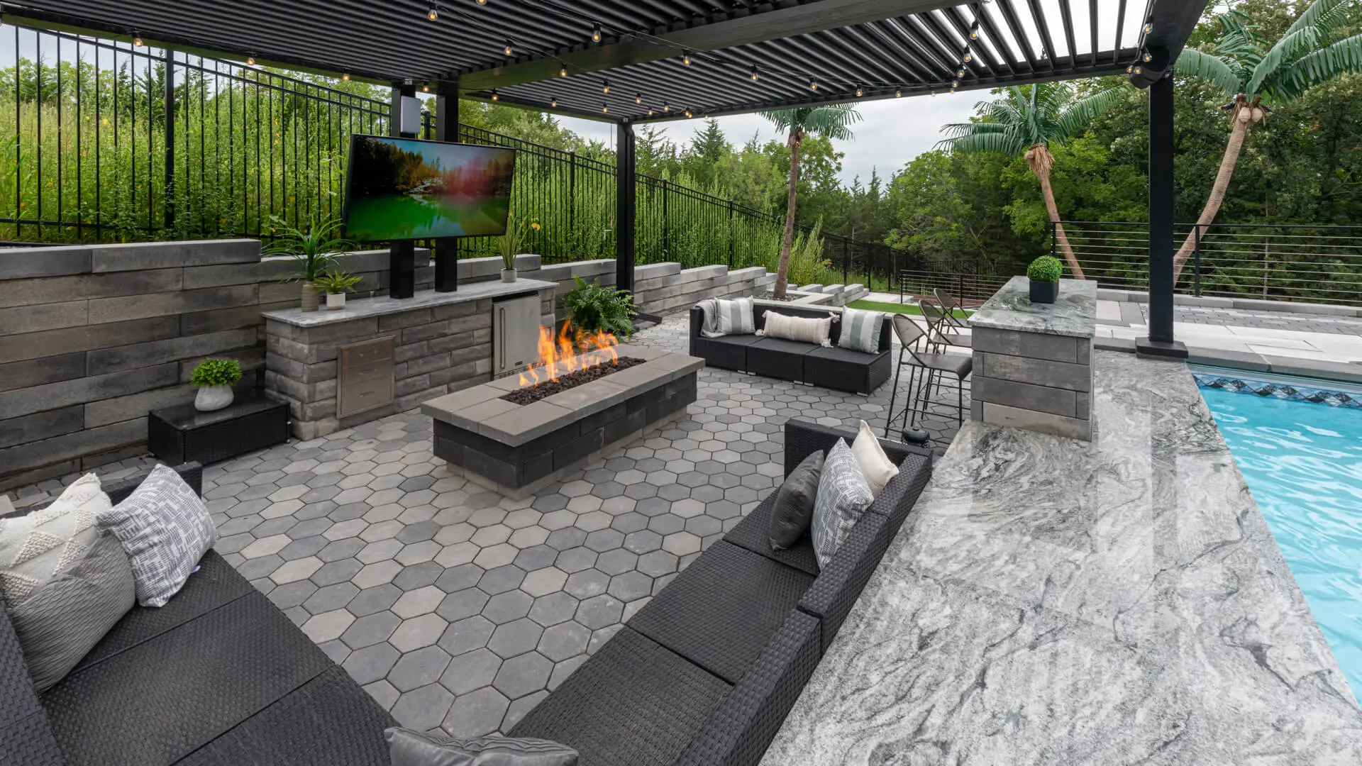 An aerial view of a new patio and fire pit installed in Omaha, NE.
