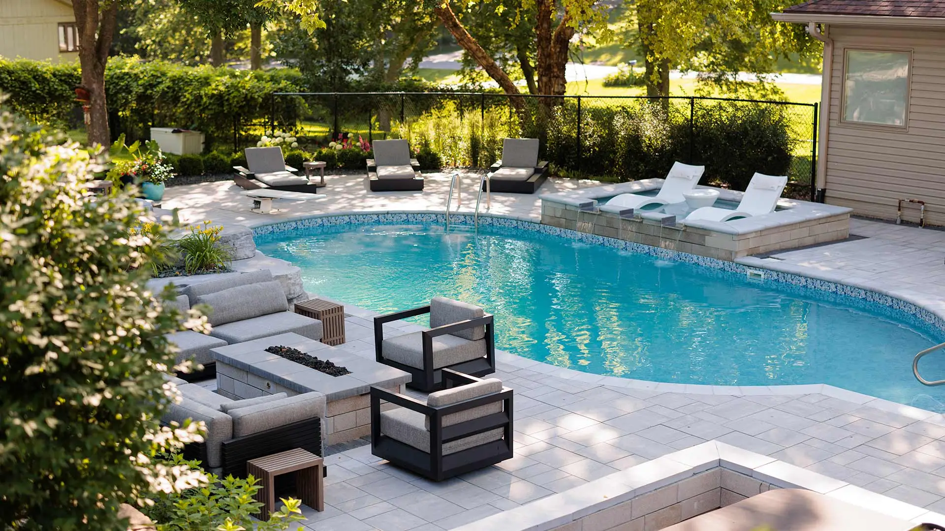 Pool Project in Papillion, NE With a Pool Deck, Outdoor Kitchen, & More