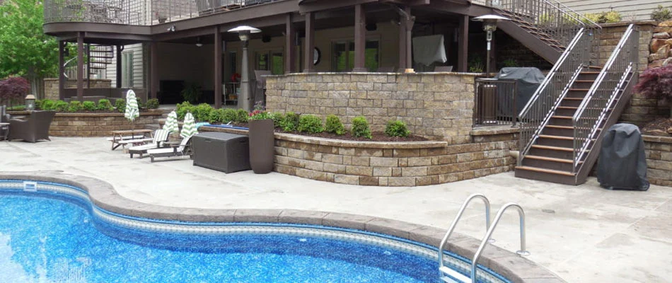 Outdoor living with swimming pool near Elkhorn, Nebraska.